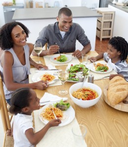 Happy family dining together